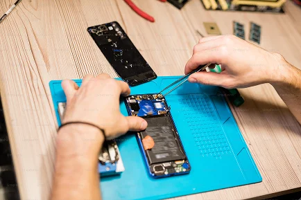 Phone motherboard repair on a professional workbench