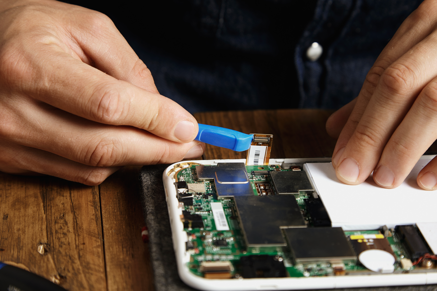 Galaxy S24 and Pixel 9 being compared for repair assessment