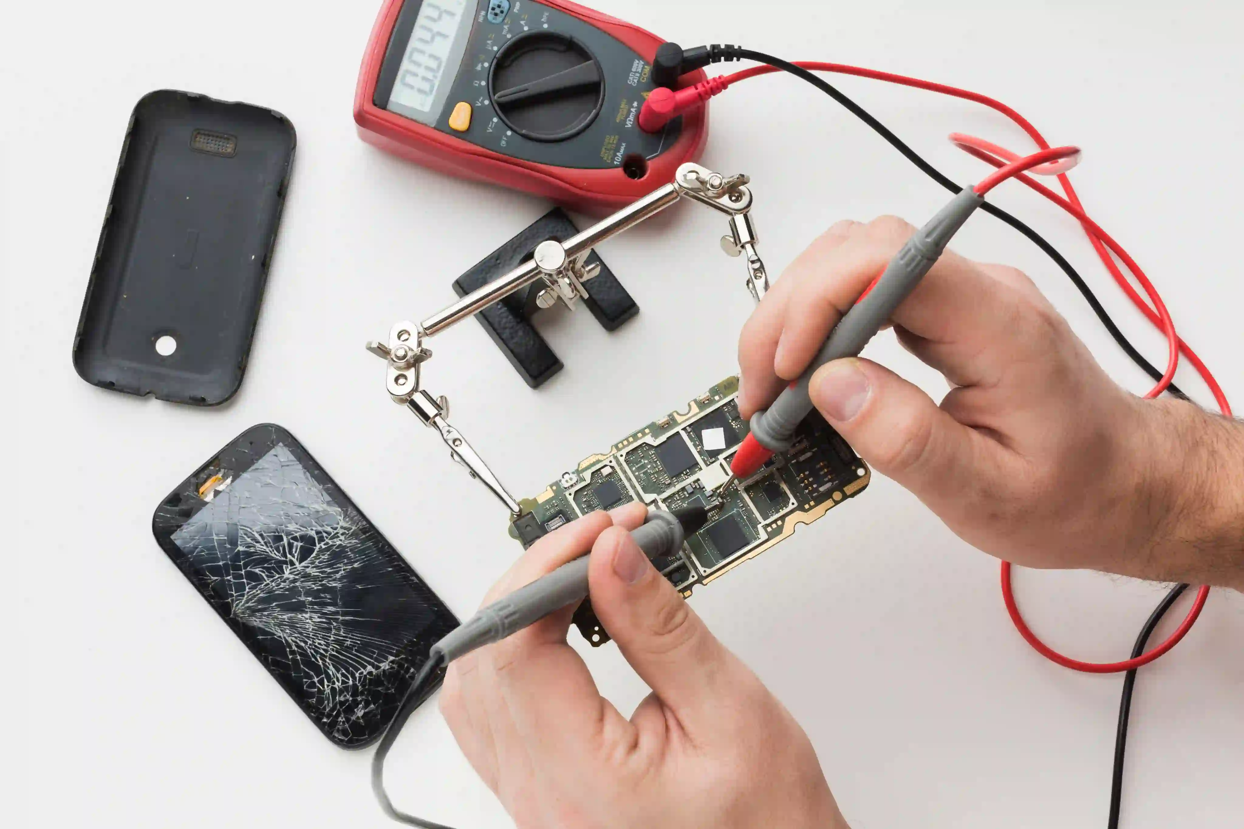 JD Phones technician repairing a smartphone in Newcastle.